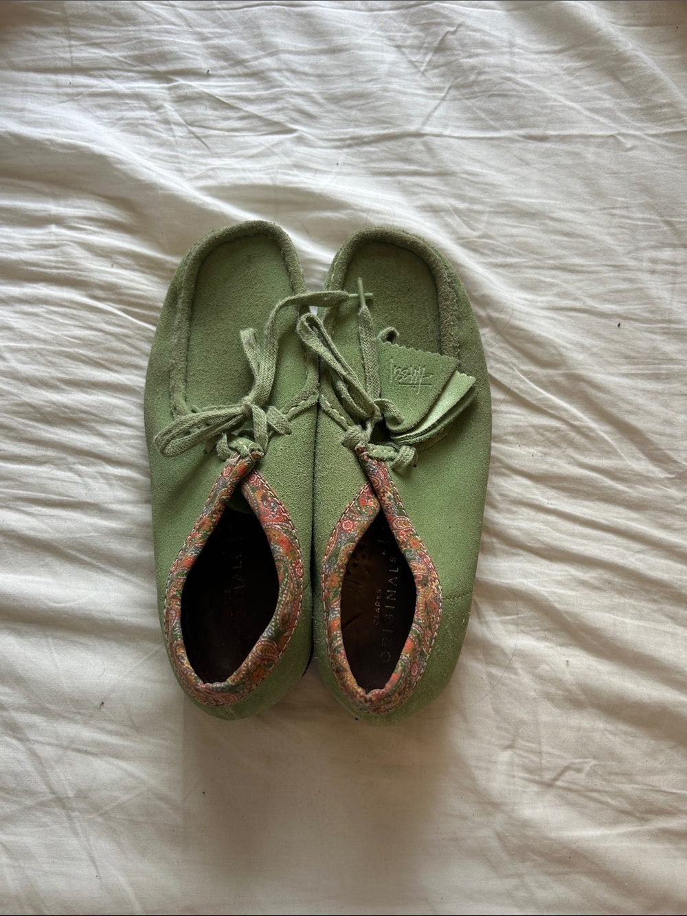 Stussy x Clarks light green with paisley trim Wallabee